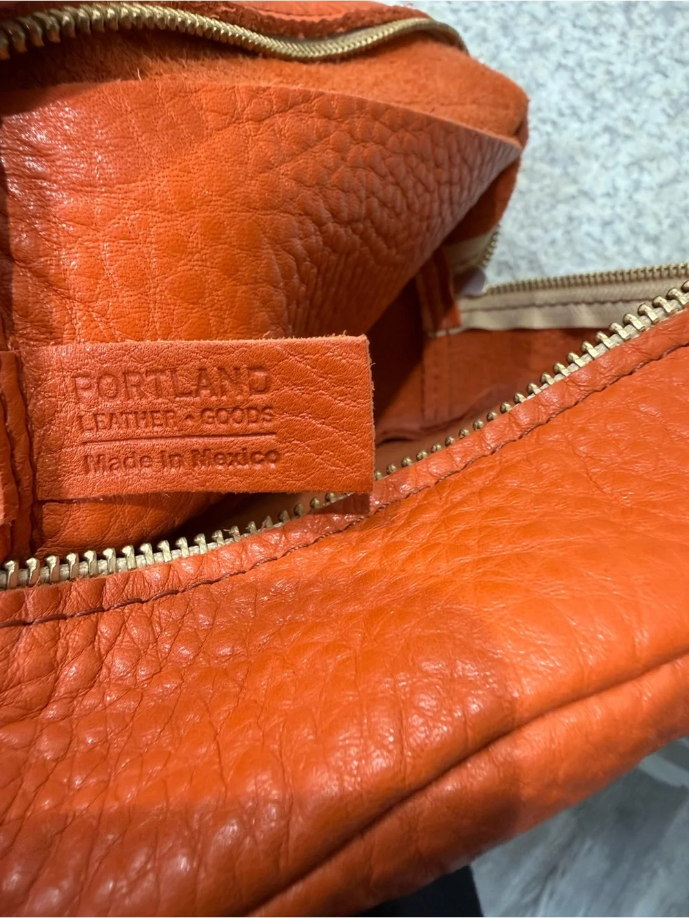 Portland Leather Orange Pebbled Leather Mini Backpack